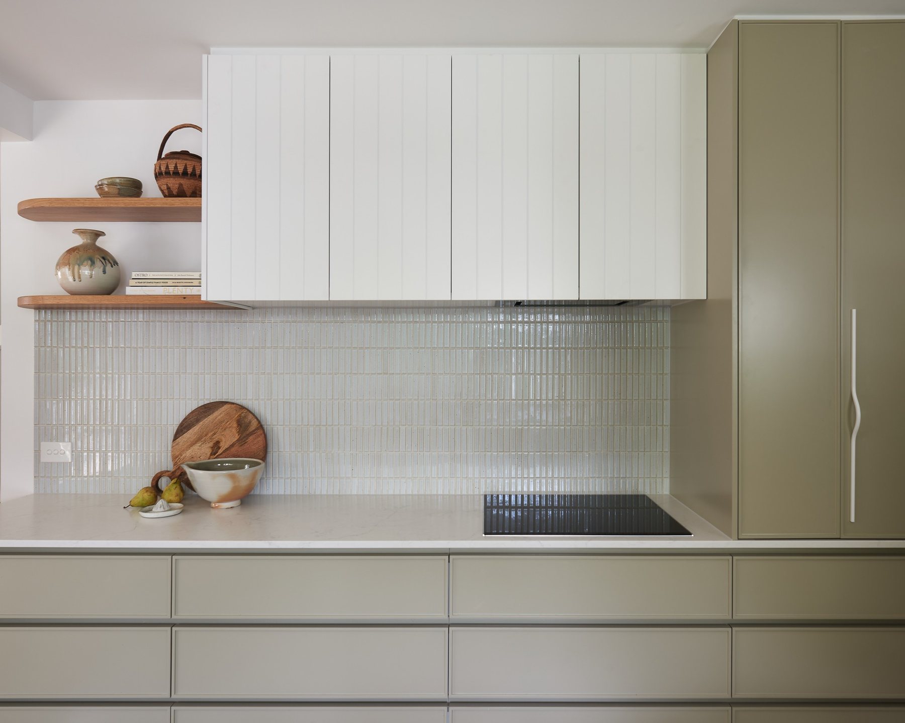 White VJ overheads with finger-tile splashback